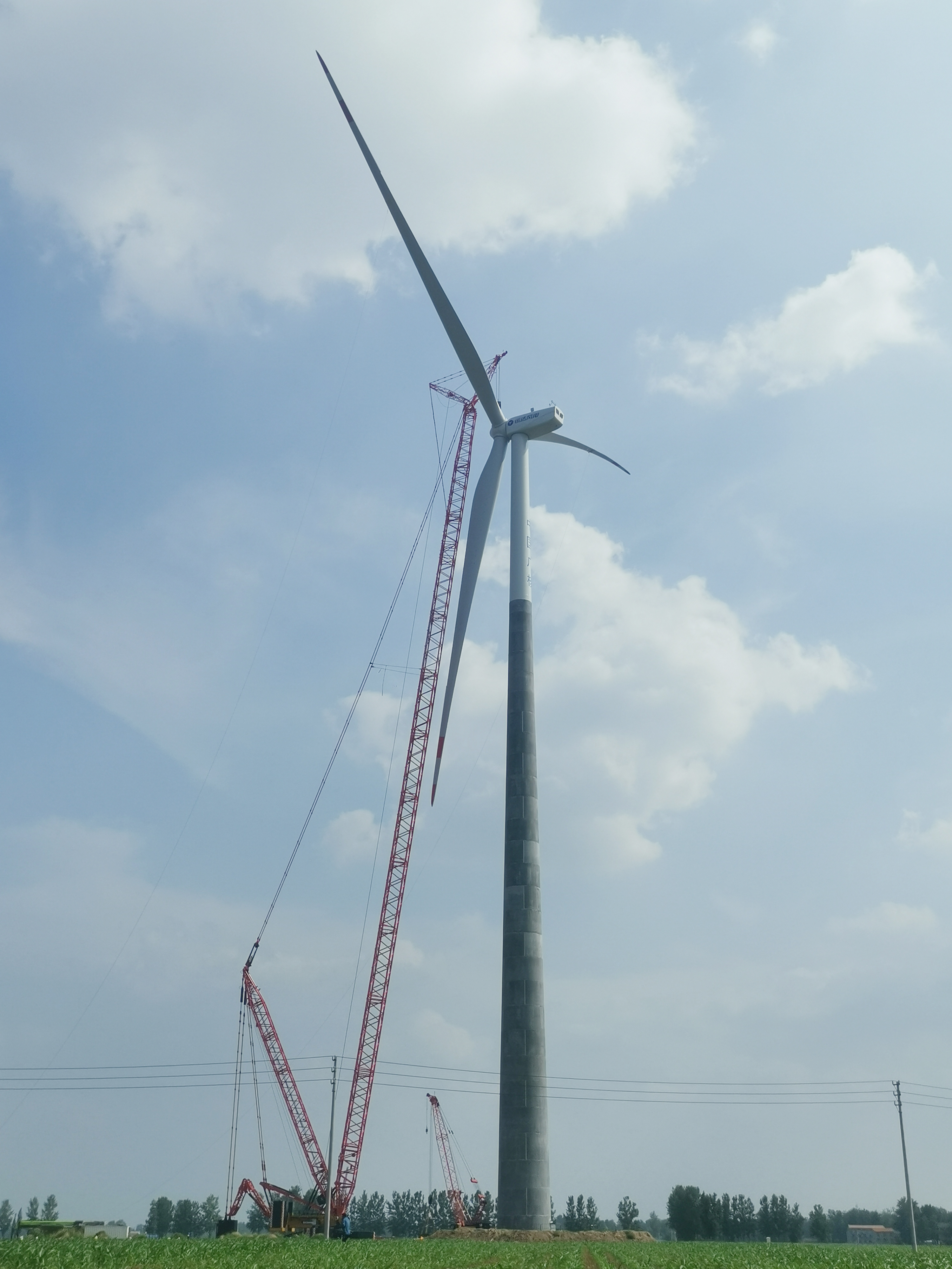 公司首台！！！150米混塔机组顺遂并网